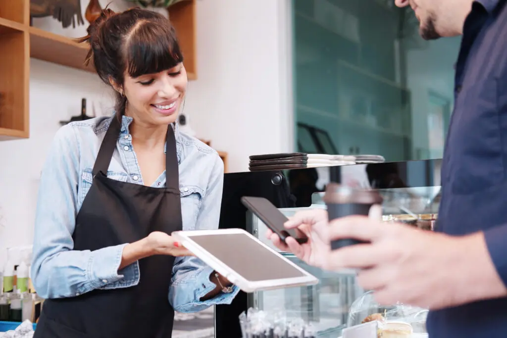 small business owner making securely making a digital transaction
