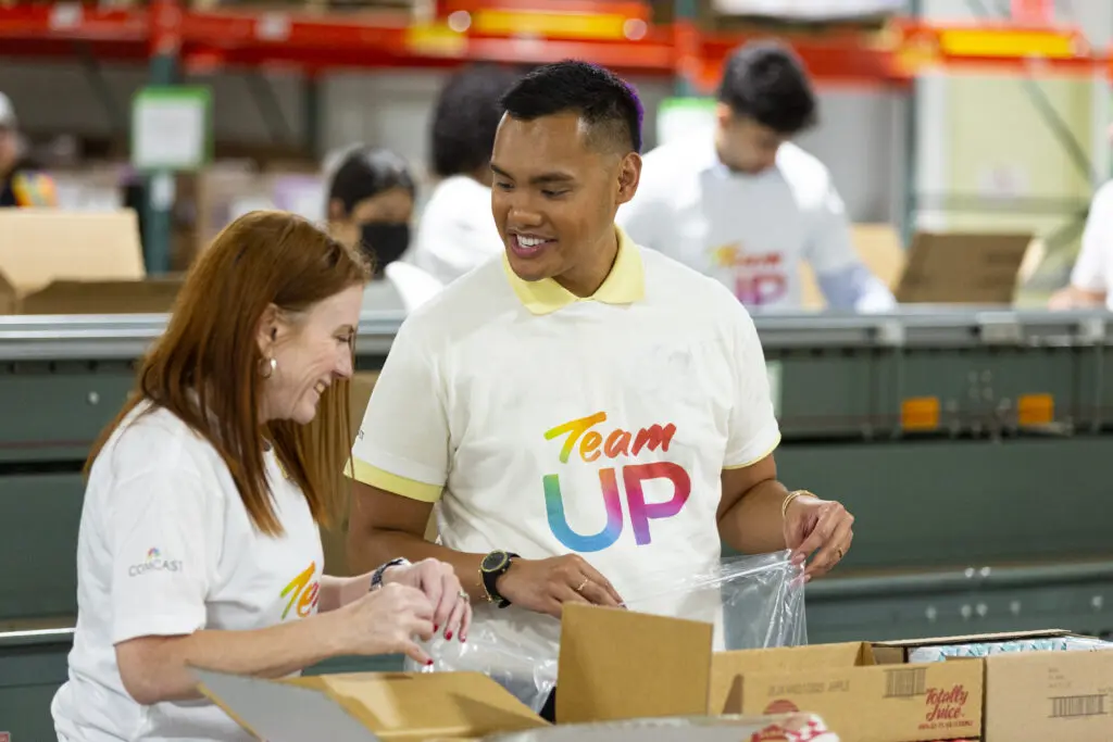 Comcast employees volunteer through Team UP which offers them the opportunity to engage with the community.