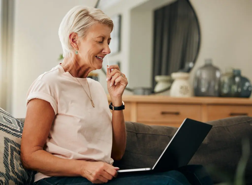 Customers on their electronic devices enjoying the Xfinity speed increase for Kentucky, including a free speed upgrade for uploads and downloads of data.