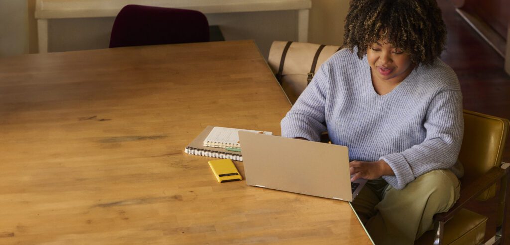 Woman studying with laptop